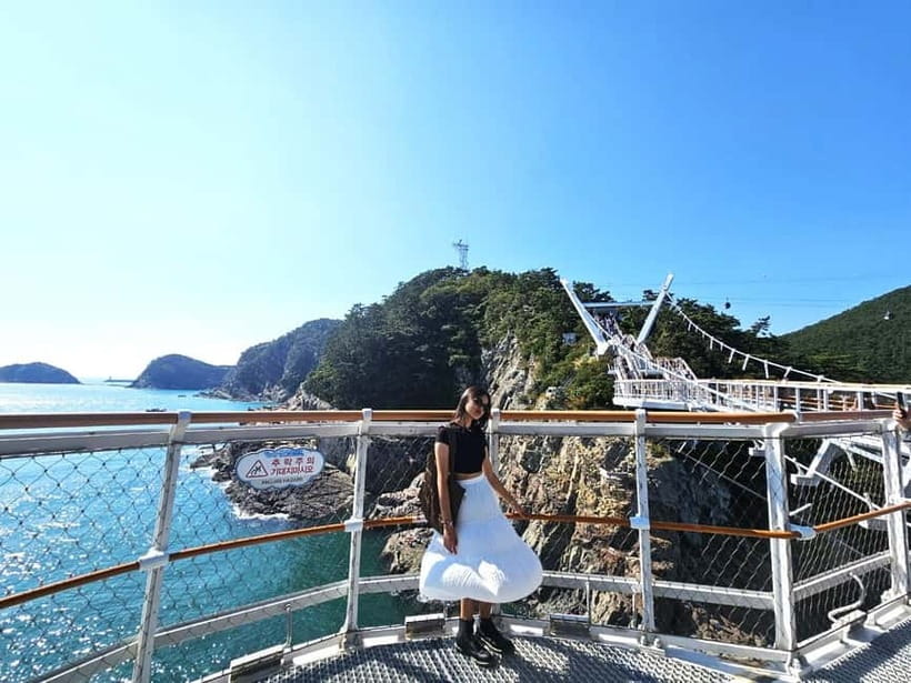 Busan: Cruise Port – Premium Small Group Tour (Max 6 Guests) - Cherry blossom photo stop at Samik Beach Apartments