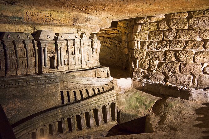 Catacombs of Paris Semi-Private VIP Restricted Access Tour - The underground reality: steps, cold, slick floors, and narrow corridors