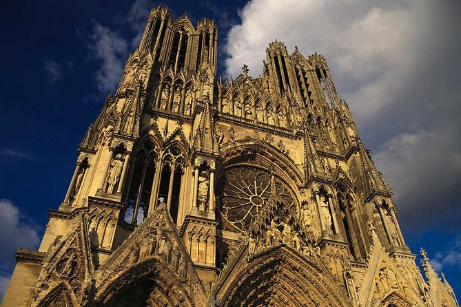 Champagne VIP Day Trip from Paris With Local PRIVATE Wine Expert Guide - Reims Cathedral and city time: Gothic drama with Champagne roots