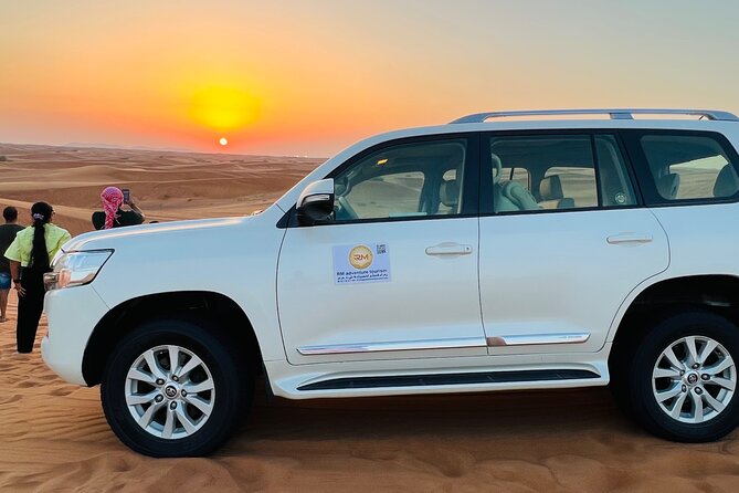 Desert Safari Tour with Camel Ride and BBQ Dinner in VIP Camp - Live shows: belly dancing, fire show, and Tanura dance