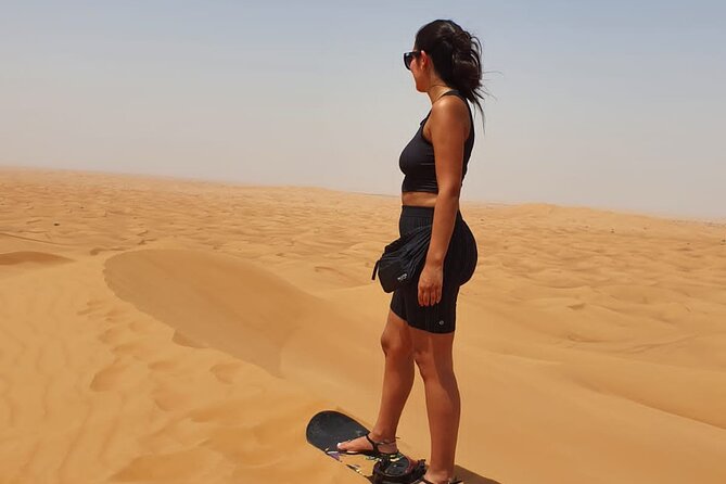 Dubai: All Inclusive Desert Safari with ATV, Camel, Horse ride, Vip & more - Sandboarding, restrooms, and photo stops: small breaks that matter