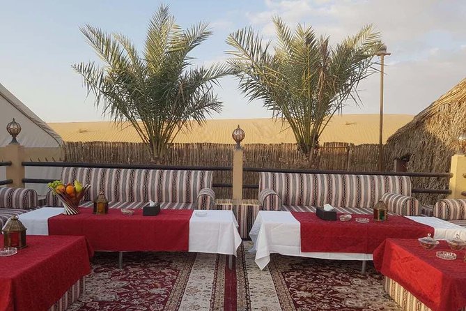 Dubai Desert Safari evening with VIP Treat , BBQ Buffet and Exciting Liveshows - Camel Ride, Sandboarding, and Henna: Hands-On Desert Moments You Can Actually Use