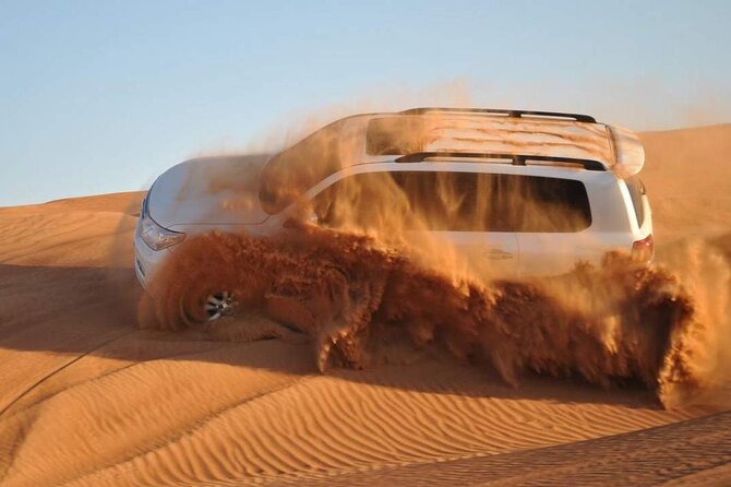 Dubai Evening 4x4 VIP Desert Safari ,Table Service BBQ Dinner - Live shows: belly dance, Tanura, fire, and Al Ayyala