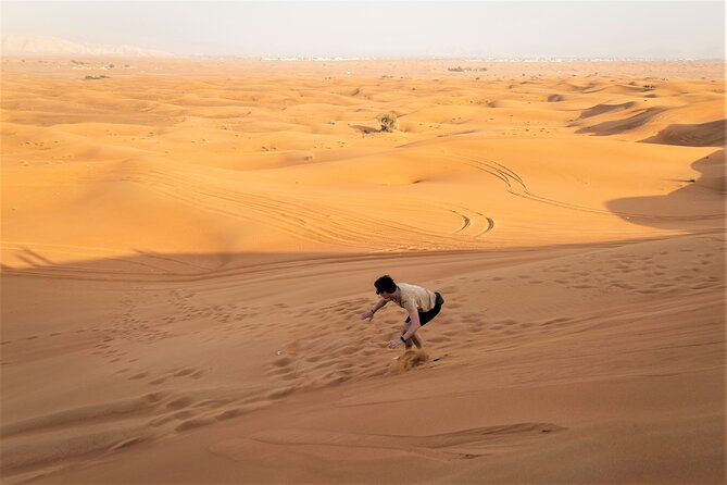 Dubai Red Dunes with Sandboarding, Camel Ride, Falcon & VIP Camp - BBQ buffet dinner, unlimited drinks, and shisha at camp