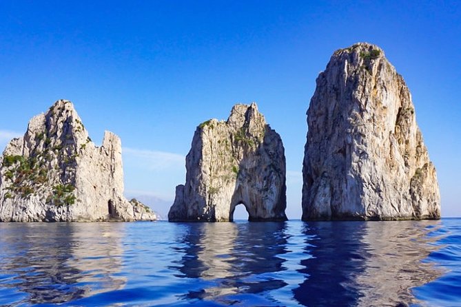 Exclusive Private VIP Capri Boat Experience on a Gozzo - Swim and snorkel stops with towels and gear ready