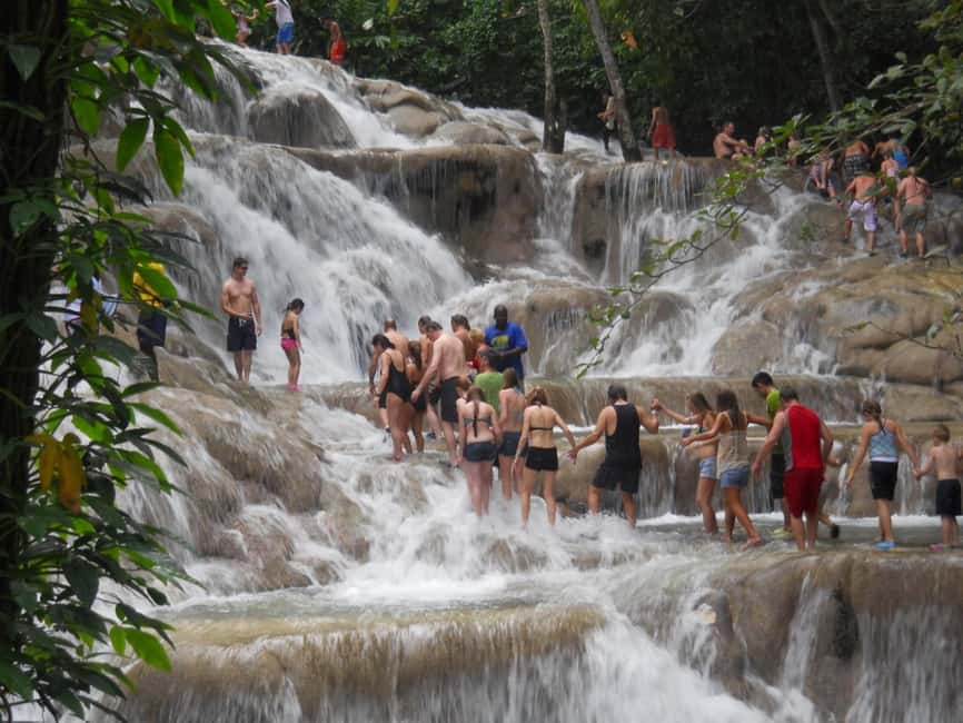 Falmouth: Dunn’s River Falls & Bamboo Beach Club VIP Access - Climbing Dunn’s River Falls: hands, wet rock, and the reason people do it