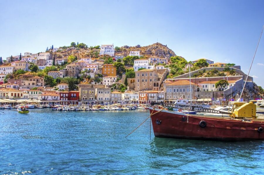 From Athens: Saronic Islands Full-Day Cruise with VIP Seats - Poros in About 50 Minutes: Pierside Views and the Clock Tower