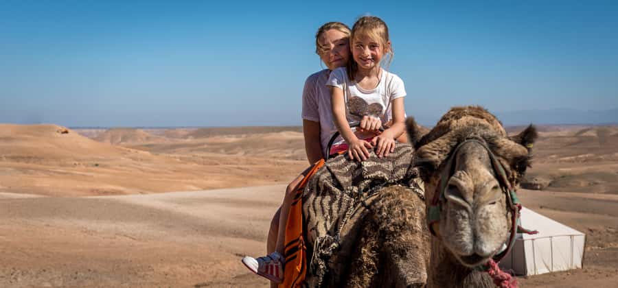 From Marrakech: VIP Agafay Desert & Oasis Camel Experience - Your 1.5-hour camel ride across stony Agafay hills