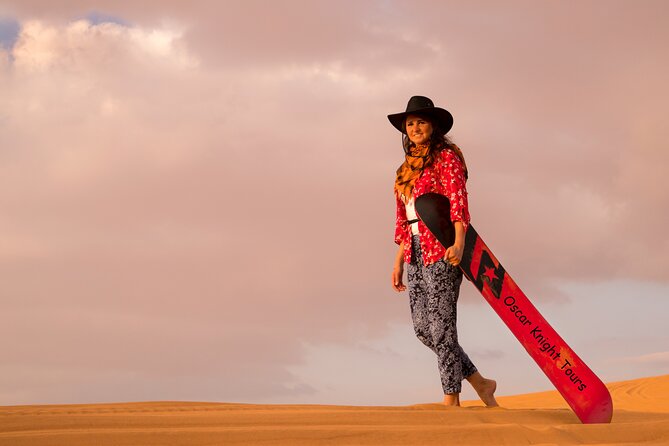 High Red Dunes with Camel Ride, Sandboarding, Falcon Show and VIP BBQ Dinner - Falcon Show, VIP BBQ Dinner, and the Live Night Entertainment
