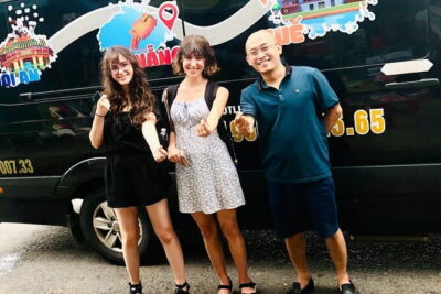 Hoi An to Da Nang Transfer - By Car - Spotting the Right Vehicle: TRAVELBUS.VN on the Car Body