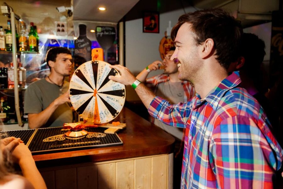 Lisbon Premium Pubcrawl: 1h Open Bar, Shots, VIP Club Entry - The guide’s role: keeping the night moving in 3 languages