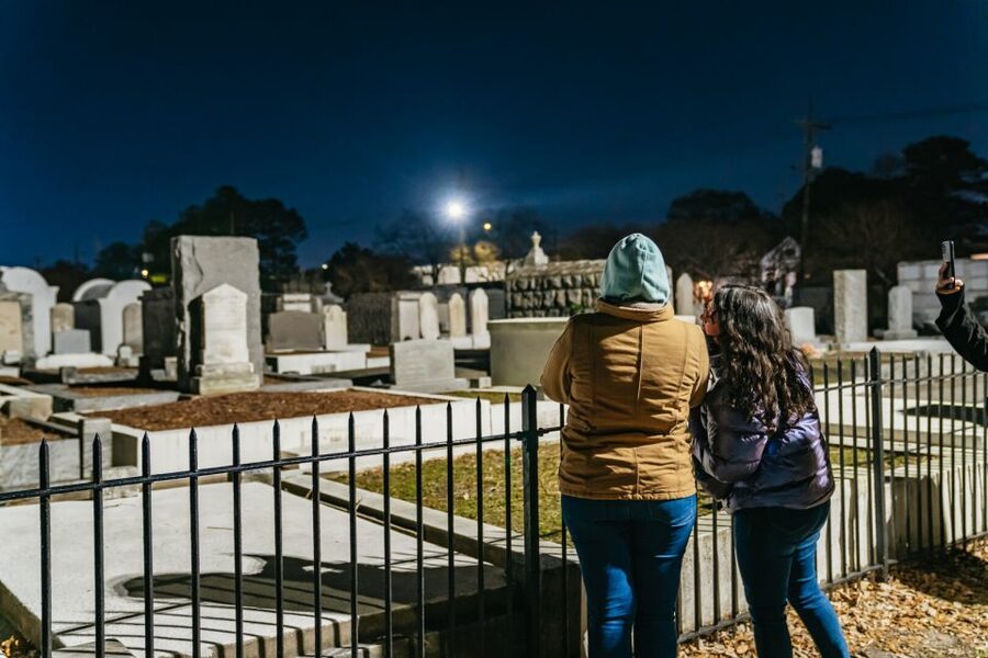 New Orleans: Cemetery Bus Tour At Dark with Exclusive Access - Charity Hospital Cemetery: Yellow Fever, Burial Customs, and a Short Walk That Counts