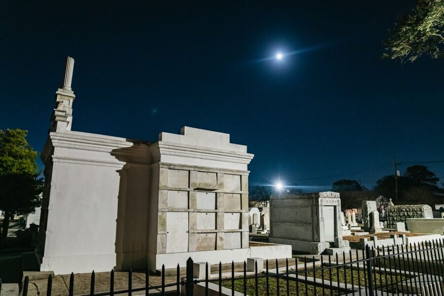 New Orleans: Cemetery Bus Tour At Dark with Exclusive Access - Guides, Storytelling Style, and the Group Energy Factor