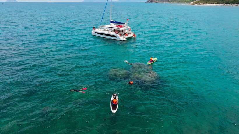 Nha Trang: VIP YACHT TOUR ( BBQ, Water activities) - SUP time: fun, balance, and a great group activity