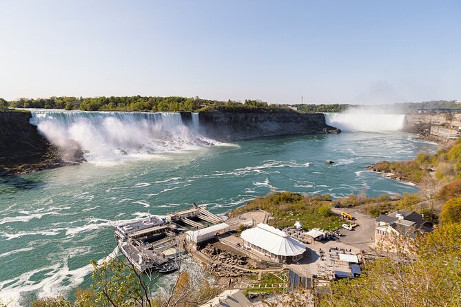 Niagara Falls Boat Ride VIP Boarding & Journey Behind the Falls - The guided boardwalk walk: history that helps you spot what you’re seeing