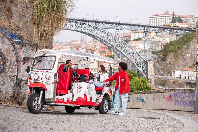 Porto: Tuk tuk vip guided tour - 1.30h - Riding a tuk-tuk VIP through Porto’s highlights