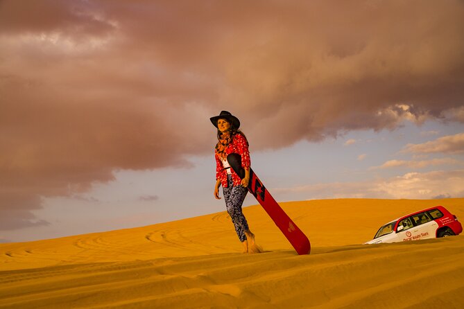 Premium Dubai Red Dunes with quadbike, camel ride and VIP Dinner - From hotel pickup to your first dune bash