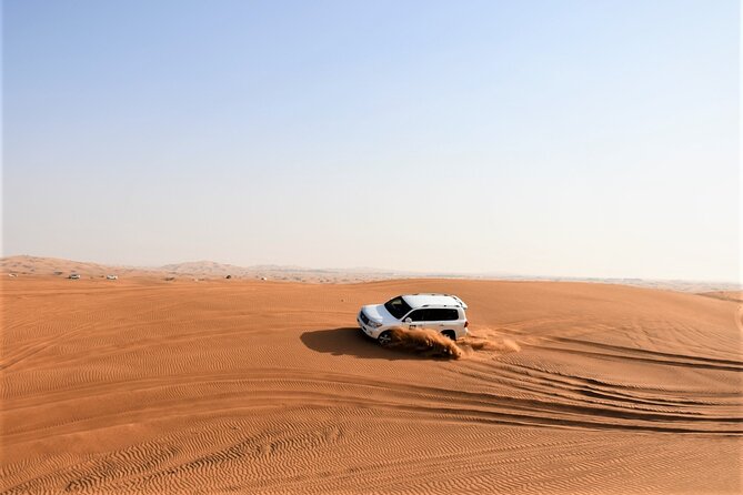 Premium Red Dunes Bashing with Quad Bike, Camel, Falcon &VIP Camp - Getting Picked Up: 4x4 Land Cruiser and the Desert Transfer