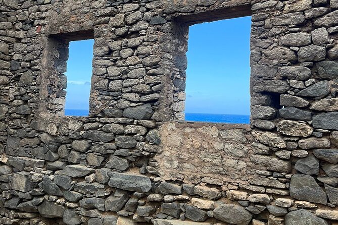 Private VIP Tours in Aruba - Alto Vista Chapel: A Yellow Landmark with Panoramic Views