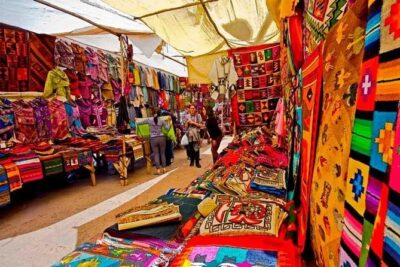 Sacred Valley VIP Tour with Maras and Moray from Cusco - Chinchero: Tupac Inca Foundations and a Market Still Moving