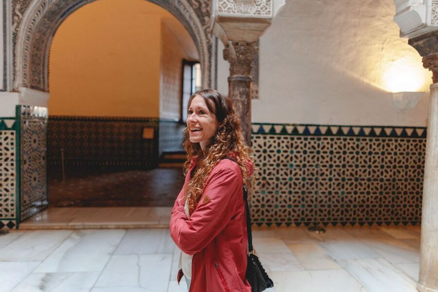 Seville: VIP Exclusive Early Access Tour of The Alcazar - The first steps: photo moment, guided walking, and quick movement past crowds