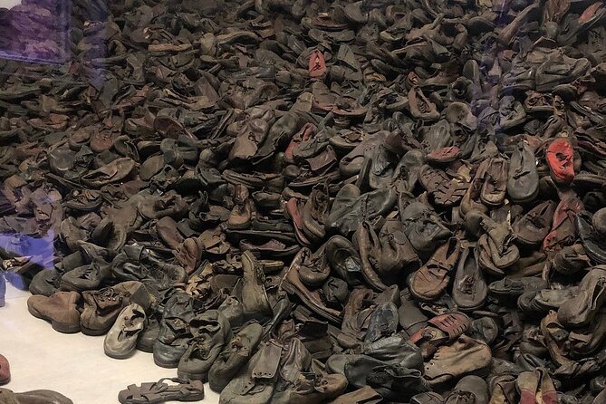 Small Group VIP Auschwitz Tour with Transportation - Auschwitz II-Birkenau: train tracks, the Gate of Death, and scale