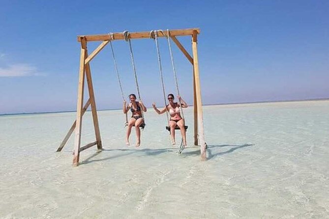 Snorkeling Day Trip To Orange Bay Island By VIP Boat In Hurghada - Water sports stop: banana boat fun at Red Sea speed