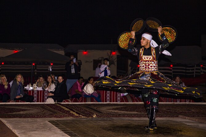 Sunset Camel Trekking with Falcon Show & VIP BBQ Dinner - Bedouin Camp Arrival: Coffee, Dates, Henna, and Falcon Time