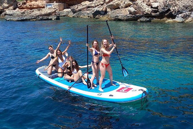 Sunset Cruise VIP (snorkeling, paddle board, & drinks Included) - Onboard comfort: sun beds, cold drinks, and light refreshments
