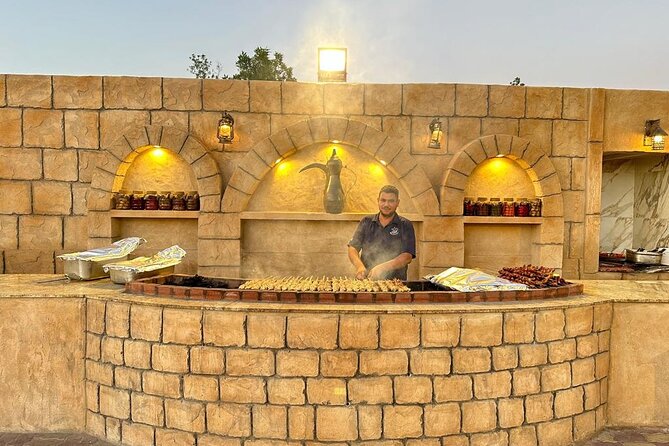 Thrilling dune bashing with VIP Desert camp delicious BBQ & shows - Dinner at the VIP desert camp: BBQ shawarma and the sides that matter