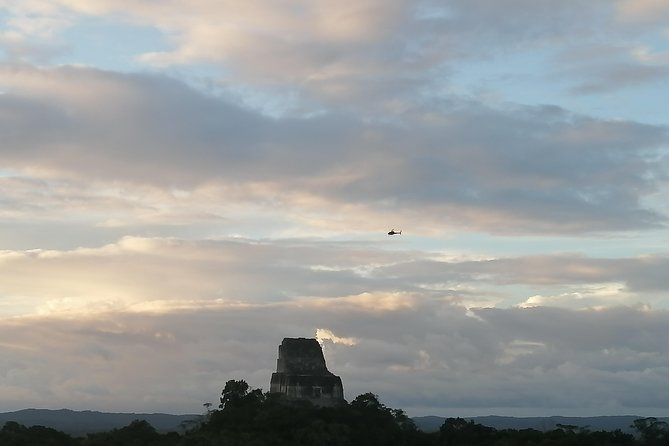 Tikal VIP Private Sunset Tour from Flores Guatemala - Flores to Tikal: meeting times, transfers, and the no-ATM warning