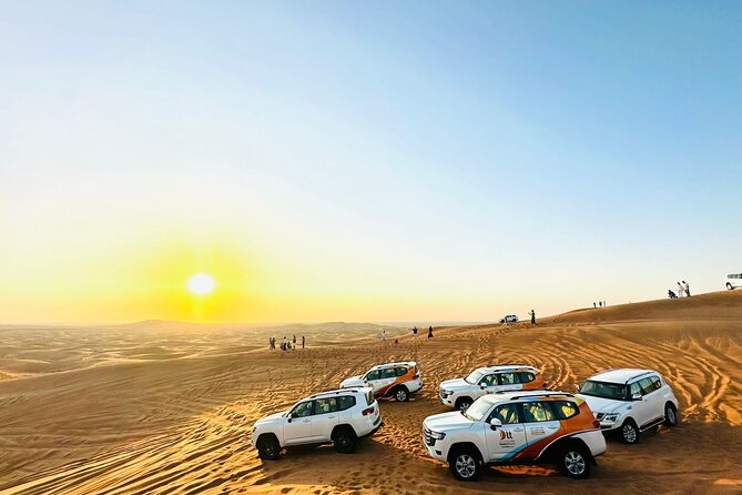 Ultimate Evening Desert Safari with Quad Biking & VIP Service - Sandboarding and sunset photo stop: the classic Dubai moment