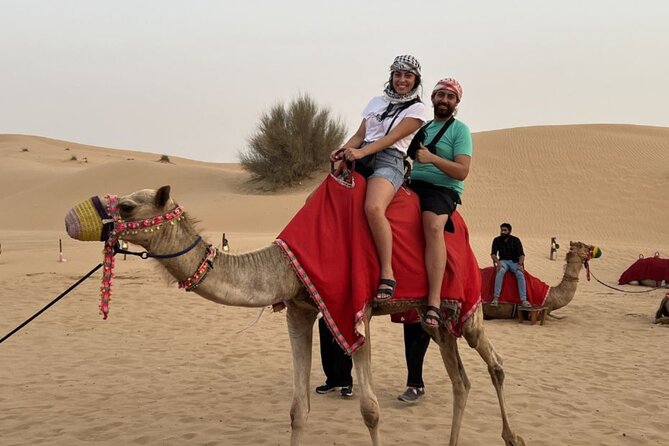 VIP Desert Safari, ATV, BBQ, Camel Ride, All Exclusive Services - Quad biking and dune bashing in the red dunes