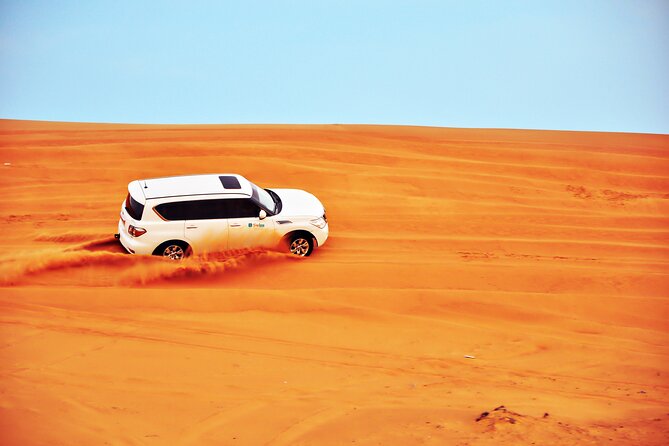 VIP Desert Safari & Dune Bashing with 5<em> Live BBQ – Dubai VIP Desert Safari: The Real Value Is the Balance’ /><br />
What you’re paying for here is not just transportation and dinner. It’s the mix: <strong>adrenaline driving</strong> in the dunes, then a full camp-style evening with desert-inspired activities and a live BBQ meal. For many people, that balance is the whole point of doing a safari in the first place. You get motion, you get scenery, and you get an evening program that feels like part of the experience instead of a quick stop.</p>
<p><p>At $54 per person, this also has a practical advantage: the included items reduce the “nickel and dime” feeling that can happen with tours that sell everything separately. You’re not just buying a ride. You’re also getting sand boarding, camel time, henna painting for ladies, water/soft drinks, and entry to the premium camp, plus the live BBQ dinner with entertainment.</p>
</p>
<p><p>One more thing I like: you’re traveling in premium 4×4 vehicles. That matters because desert driving is a different sport than city driving. The vehicle comfort and the driver’s skill affect how safe and fun that ride feels.</p>
</p>
<h2 id="pickup-timing-and-group-size-how-the-day-flows">Pickup, Timing, and Group Size: How the Day Flows</h2>
<p><img width="669" height="446" decoding="async" src=