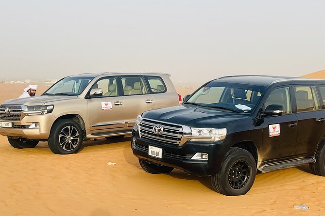 VIP Desert Safari with High Red Dune Bashing & Live BBQ Dinner - Stop 1: Lahbab red-dune bashing plus sandboarding
