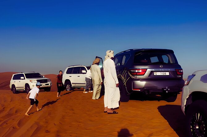 Vip Dubai Desert Safari with Camel Riding,BBQ Dinner - Lahbab Red Arabian Desert: Dune Bashing, Sandboarding, and Sunset Photos