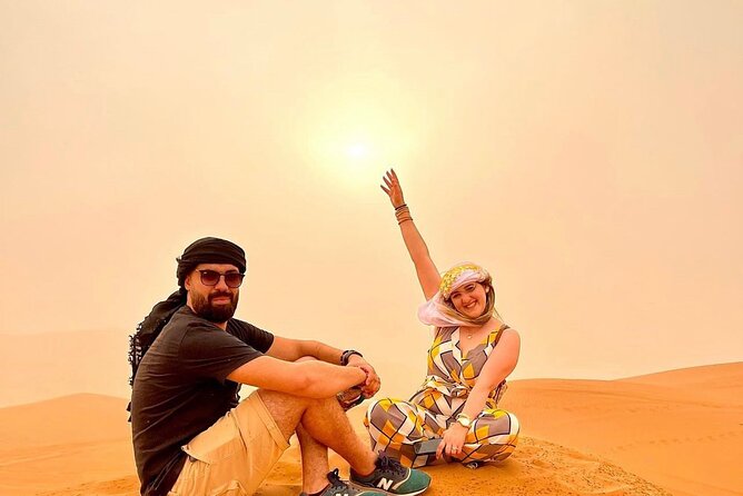 VIP Dubai Desert Safari with Quadbike,Sandboarding & BBQ dinner - Adventure Planet camp: camel photos and live shows after dark