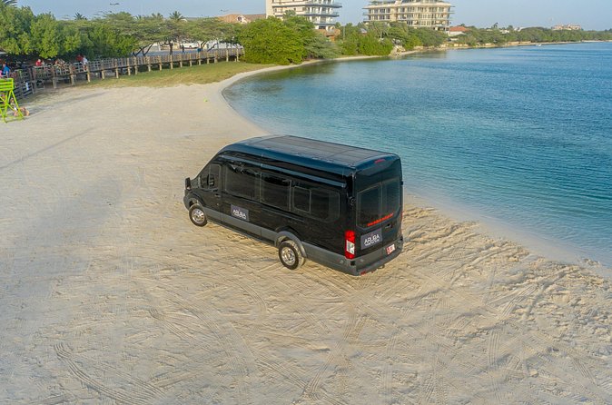 VIP private Airport Transfer roundtrip - The 30-Minute Ride to Palm Beach/Noord: Comfort Without the Guesswork