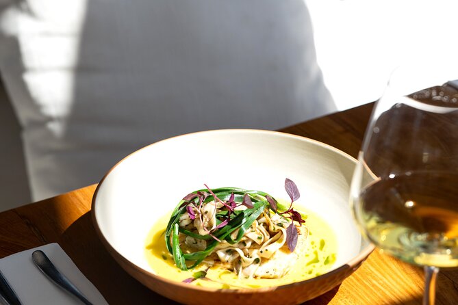 Waiheke Island: Afternoon Wine Affair with Ocean Front Lunch - Guides, commentary, and the human side of wine touring
